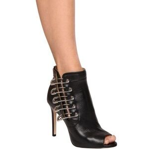 - Katy Perry Black Leather Stiletto Ankle Boots with Bobby pin details